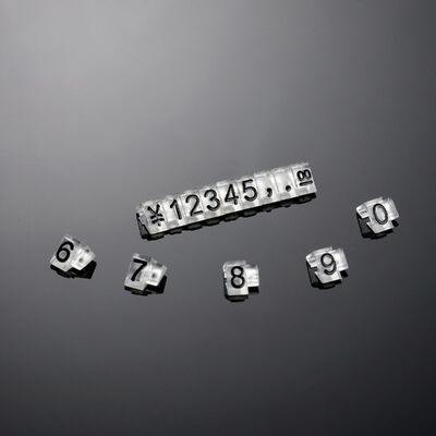 140 pcs AP3-5-3 Triangular price cubes are made from Transparent plastic and have embossed black lettering